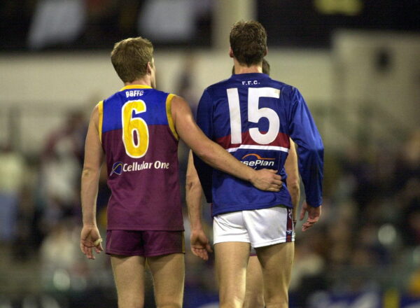 NPX211332_hi-res (1) AUGUST 10, 2002 Luke (left) and Sam Power. Brisbane Lions v Western Bulldogs at the Gabba. football. Pic: QLD / AFL / Brothers / Family / Teams Published: DHS 12/8/02, p.41. OldPixRef: 10790423 OldPixCat: Sports (Photo by Simon Renilson / Newspix)
